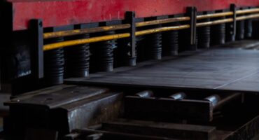 Closeup of Industrial Mild Steel Plate Cutting Hydraulic Machine